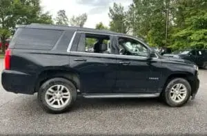 Chevrolet Tahoe negra, vista lateral - Carmexio Queretaro
