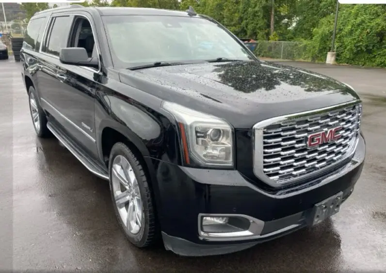 2018 GMC Yukon XL 1500 Denali - vista lateral trasero